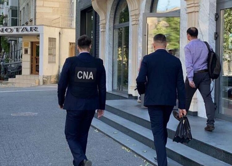 Ofițerii CNA au descins la ANRE, într-un dosar de corupție