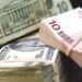 Euro și dolarul se ieftinesc