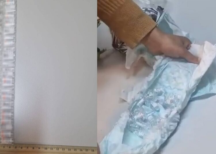 VIDEO // Fiole cu analgezice opioide, ascunse în scutece și pachete de țigări, depistate la PTF Otaci