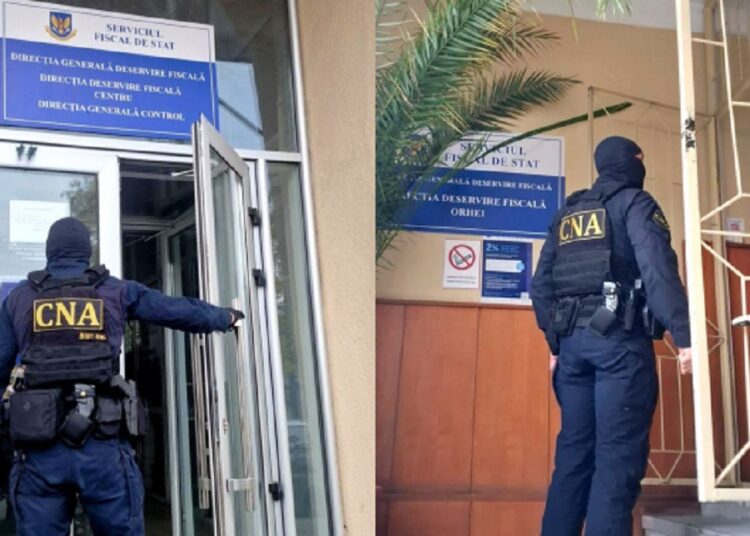 CNA a bătut la ușa FISC-ului. Un funcționar a fost reținut, iar alte 3 persoane sunt cercetate în stare de libertate