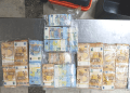 VIDEO // Doi șoferi au fost arestați după ce au încercat să introducă ilegal în țară aproape 170.000 de euro ascunși într-o ladă frigorifică