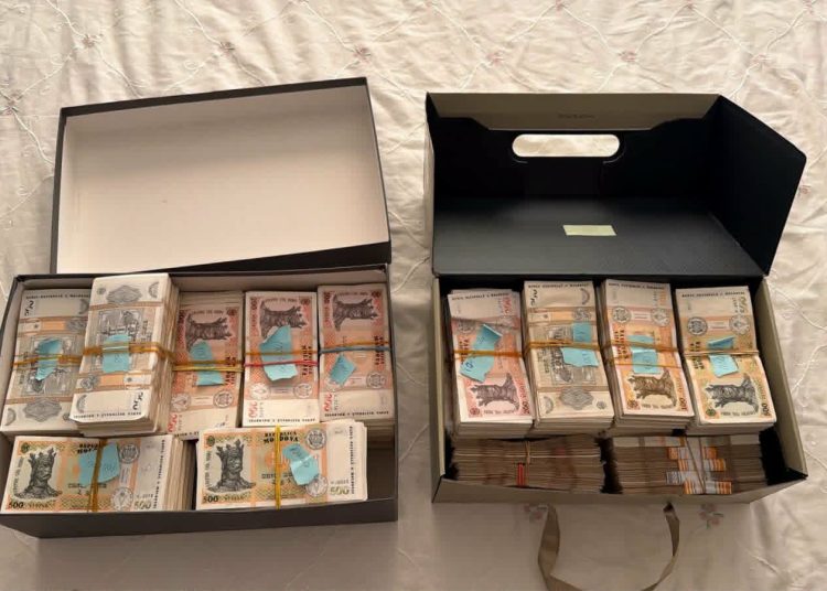 FOTO // Un șef de Direcție de la AIPA, reținut de CNA. Ar fi primit 130.000 de lei pentru a influența acordarea unei subvenții